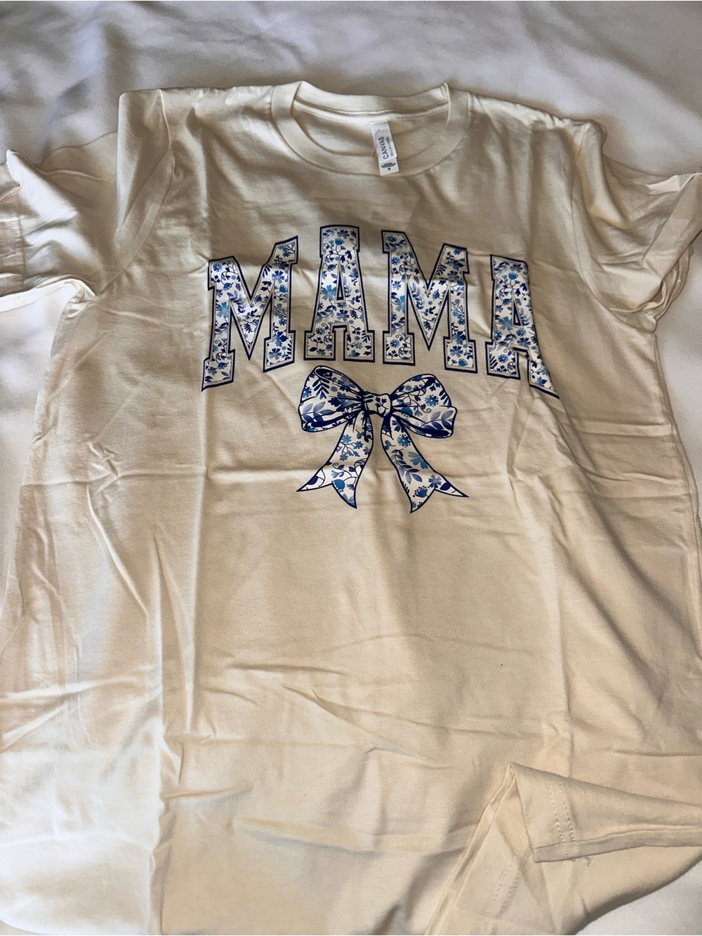 Bella Canvas Cream Short Sleeve Tee with Blue Floral 'MAMA' Graphic and Bow